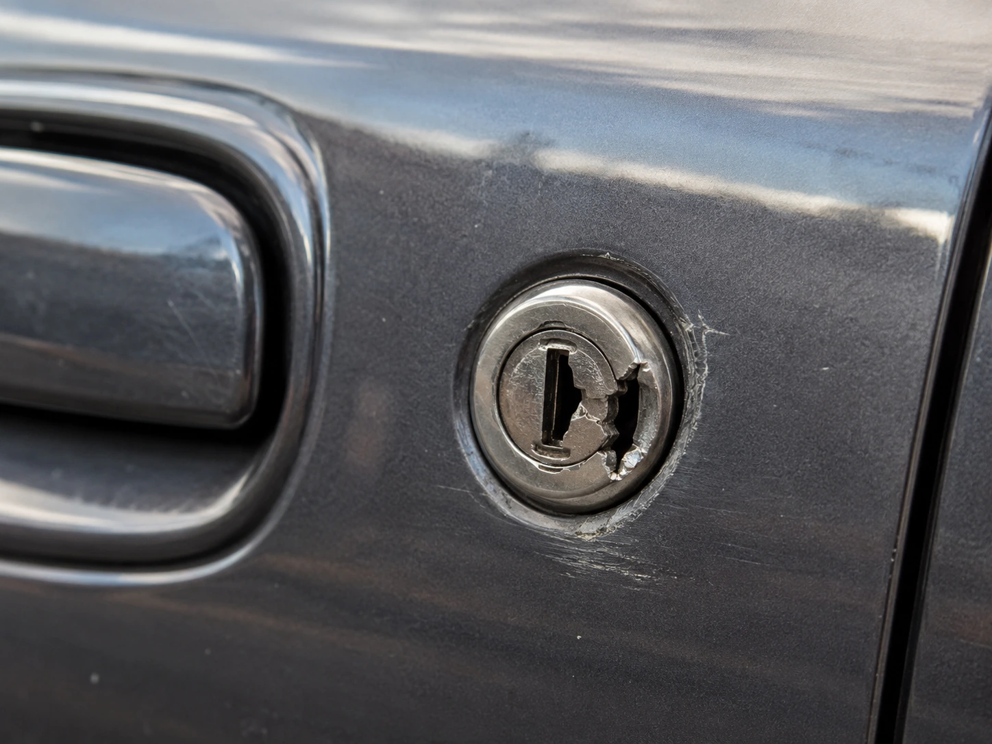 Broken car lock close-up